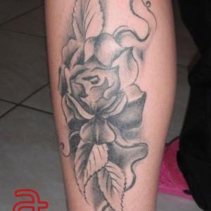 Rose tattoo by Dr.Ink Atkatattoo