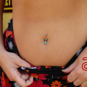 Navel piercing by Dr.Ink Atkatattoo