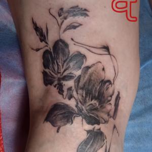 Abstract flowers tattoo by Dr.Ink Atkatattoo