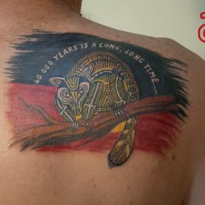 Aboriginal flag tattoo by Dr.Ink Atkatattoo