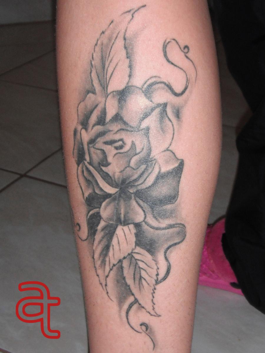 Rose tattoo by Dr.Ink Atkatattoo