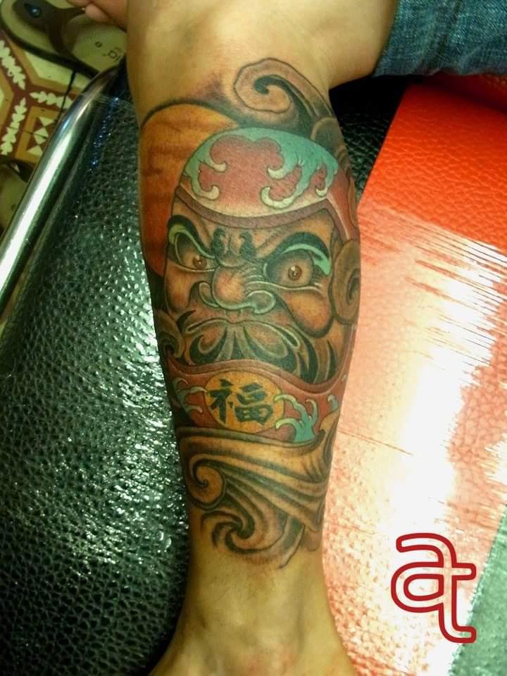 Daruma doll tattoo by Dr.Ink Atkatattoo
