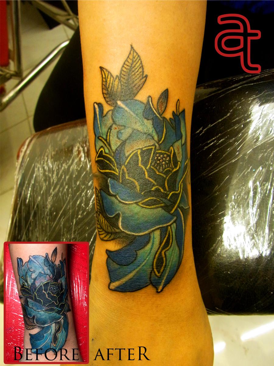 Flower renewal tattoo by Dr.Ink Atkatattoo